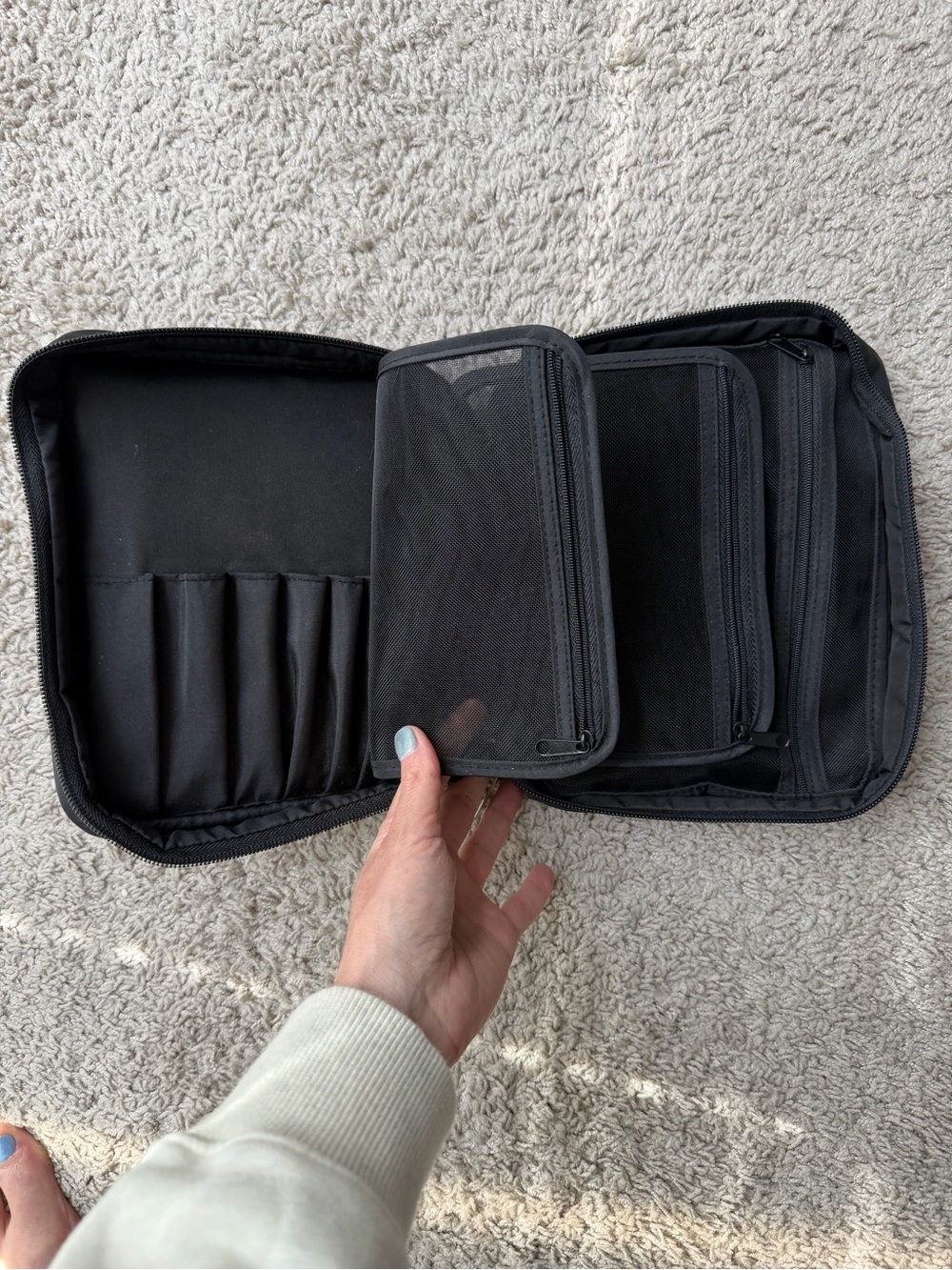 Black Travel Makeup and/or jewelry pouch by Bobbi Brown. Like new.